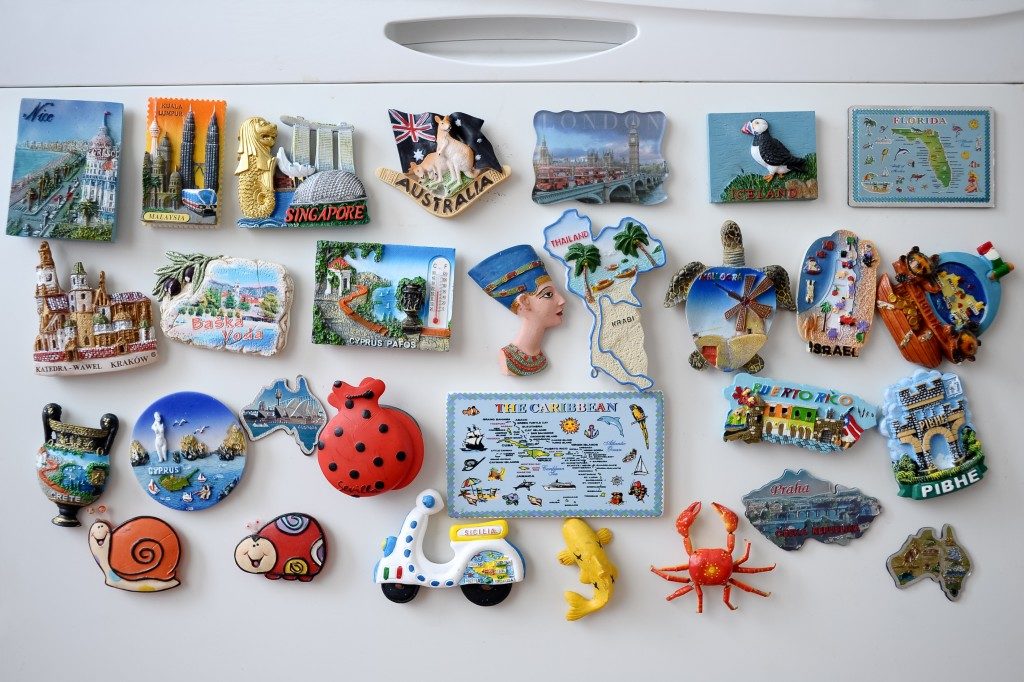 souvenir magnets on fridge