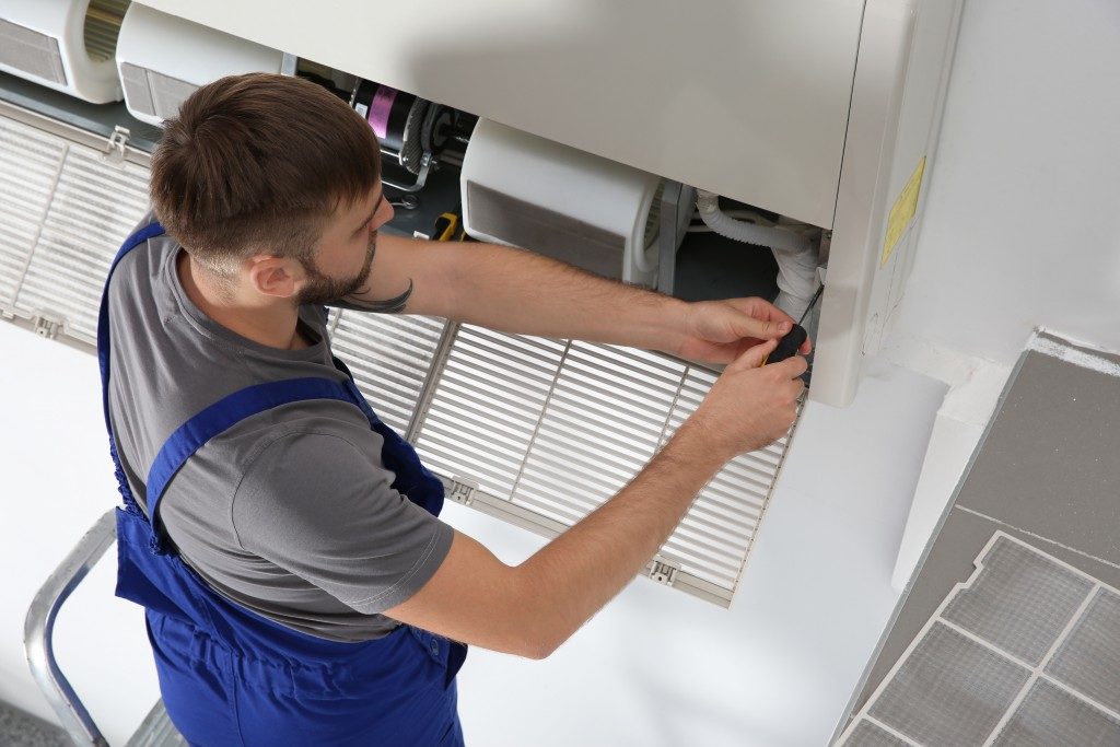 contractor fixing ventilation