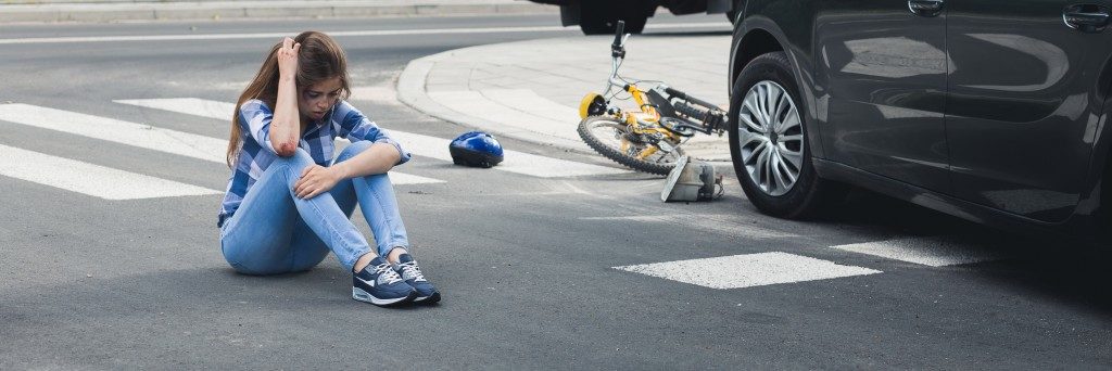 girl on the floor after an accident