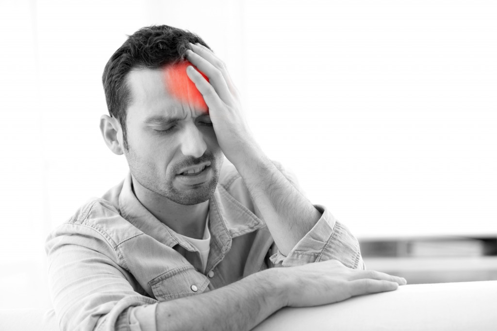A stressed person having headache